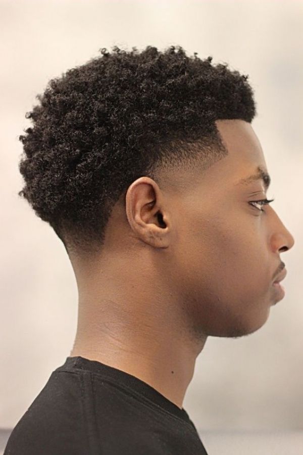 A sharp skin fade with clean lines at GEE M'S Barbershop, Nairobi