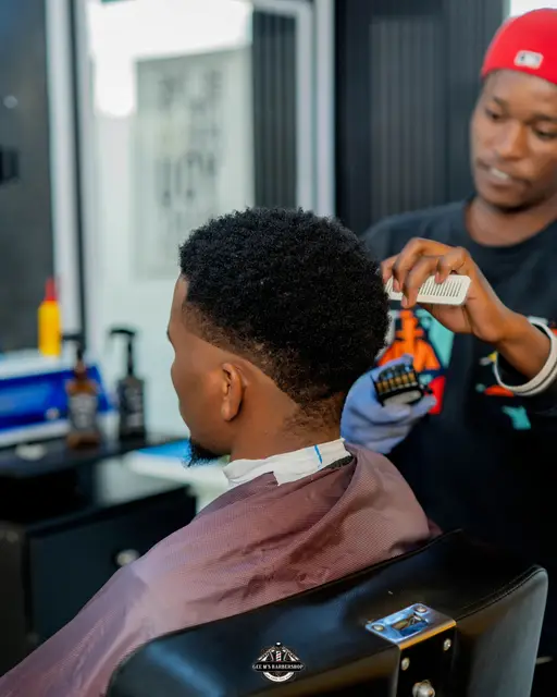 Haircut and fade in progress at GEE M'S Barbershop, Nairobi, photo 6