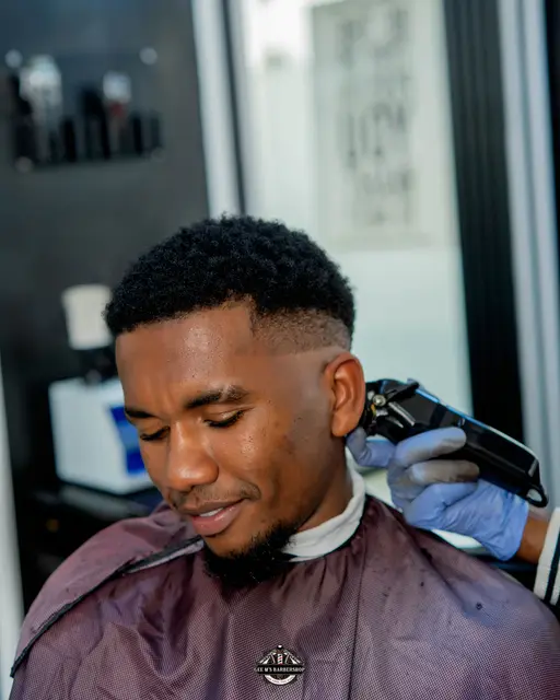 Haircut and fade in progress at GEE M'S Barbershop, Nairobi, photo 10
